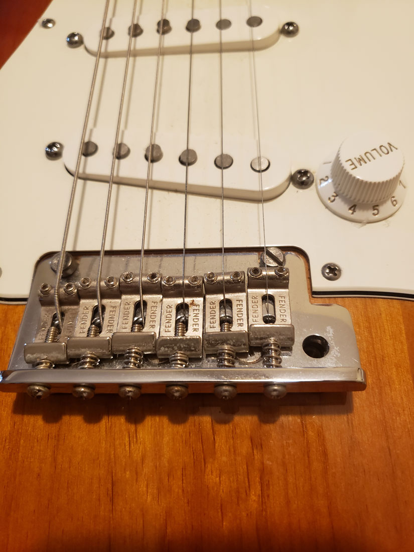 photo of a guitar closeup