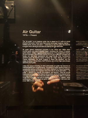 Air guitar placard