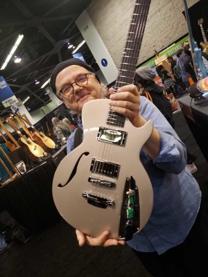 Guitarist and friend Joe Craig showing off an AVA Guitar (Portugal) Bloody Pearl at The NAMM Show, 2020